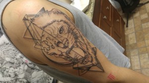 Geometric Lion Tattoo Completed in two sessions by Raul Regalado at Skinhouse Tattoo Studio in Longmont, CO.