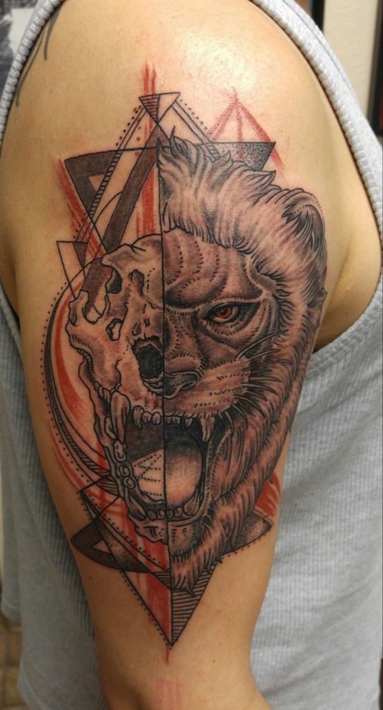 Geometric Lion Tattoo Completed in two sessions by Raul Regalado at Skinhouse Tattoo Studio in Longmont, C