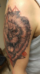 Geometric Lion Tattoo Completed in two sessions by Raul Regalado at Skinhouse Tattoo Studio in Longmont, CO.