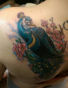 Her father had a tattoo of a peacock, so in respect to that, she had a tattoo of the same decorative bird. Tattoo done by Raul Regalado at Skinhouse Tattoo Studio in Longmont, CO