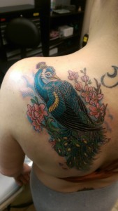 Her father had a tattoo of a peacock, so in respect to that, she had a tattoo of the same decorative bird. Tattoo done by Raul Regalado at Skinhouse Tattoo Studio in Longmont, CO