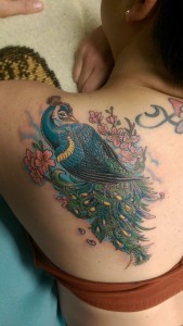 Her father had a tattoo of a peacock, so in respect to that, she had a tattoo of the same decorative bird. Tattoo done by Raul Regalado at Skinhouse Tattoo Studio in Longmont, CO