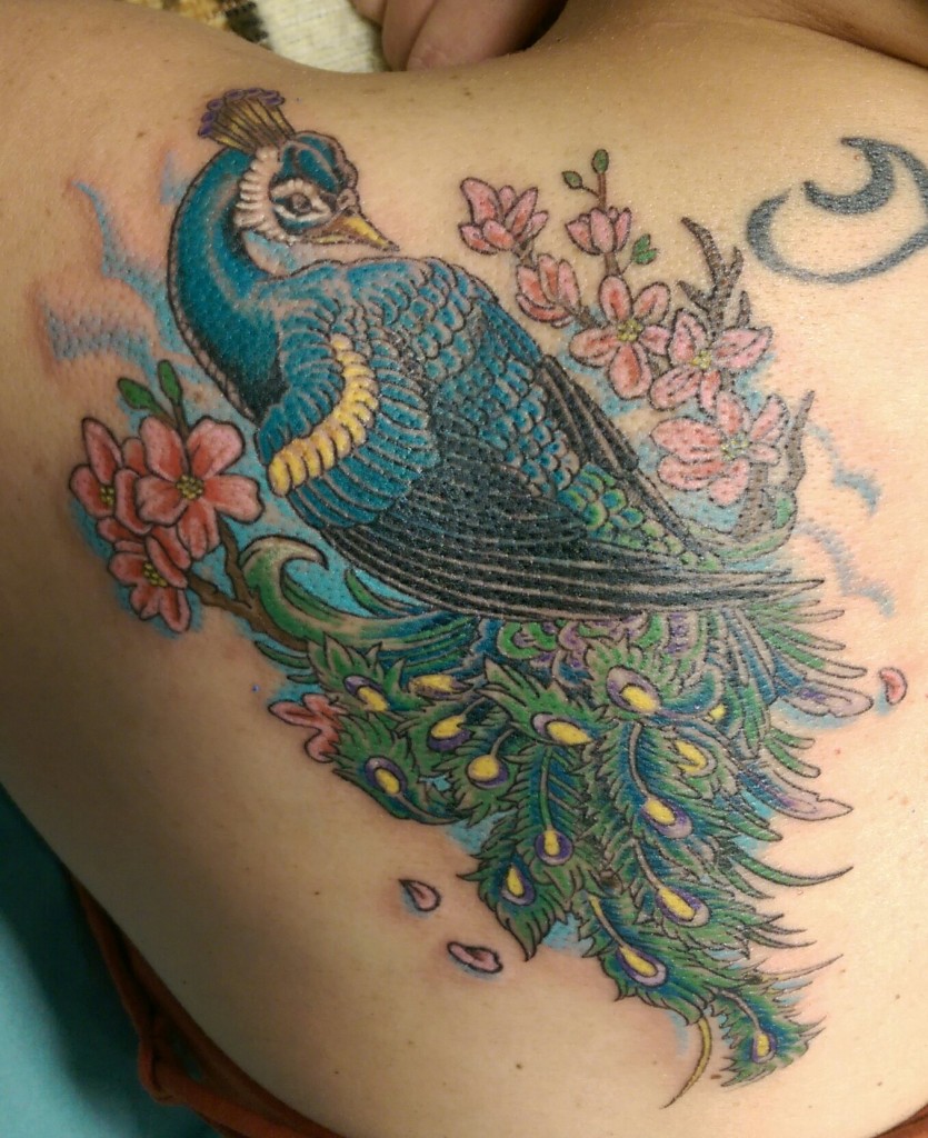 Her father had a tattoo of a peacock, so in respect to that, she had a tattoo of the same decorative bird. Tattoo done by Raul Regalado at Skinhouse Tattoo Studio in Longmont, CO